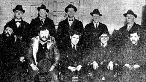 Left to Right (Standing): City Marshal Alfred T. Caron of Chicopee, State Detective Maurice F. Nelligan of Northampton, State Director of Public Safety Alfred T. Foote of Holyoke, State Detective David J. Manning and State Detective Thomas Bligh both of Springfield. Left to Right (Sitting): Dominick Penatti, Frank Lucibello, Harry Vincent, William Guangi and John Pinto, all of new Haven. 